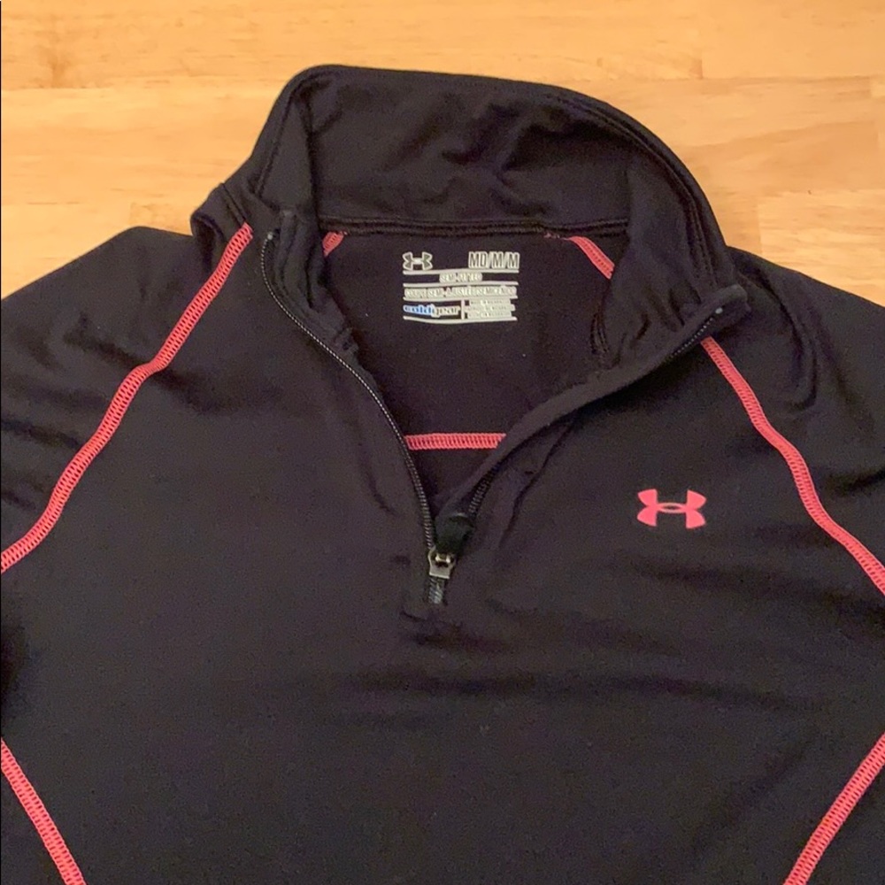 Under Armour 1/4 zip up long sleeve ladies top.